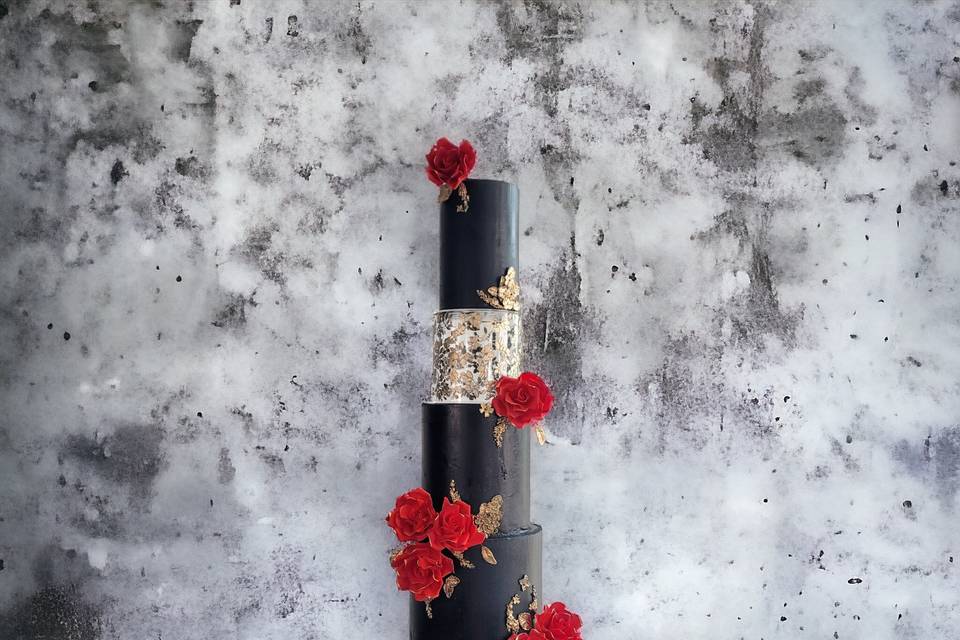 Black, gold and red roses