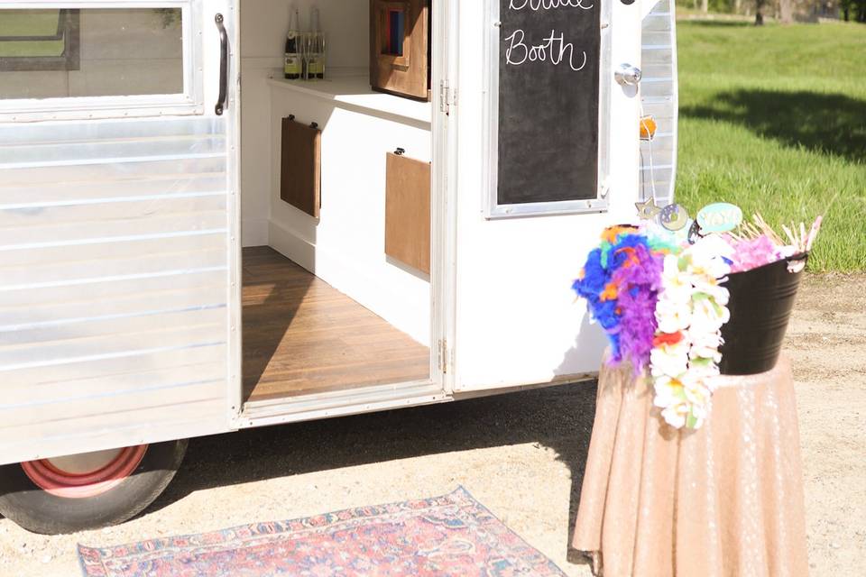 A vintage camper photo booth