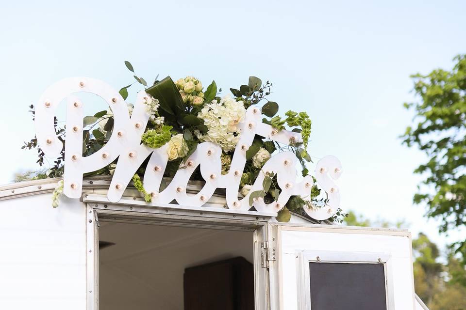 A vintage camper photo booth