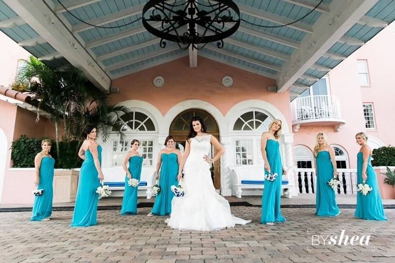 Bride and bridesmaids by the entrance