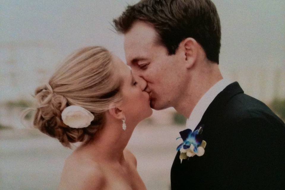 Newlyweds kissing