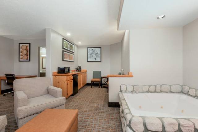 A suite with a kitchenette as well as our refinished spa tubs.