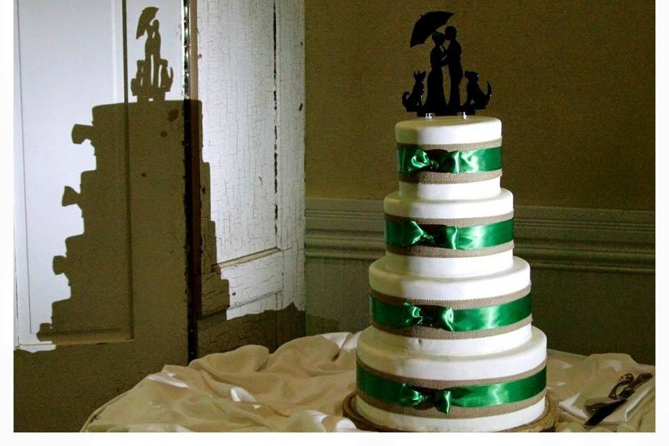 4-tier wedding cake with green details