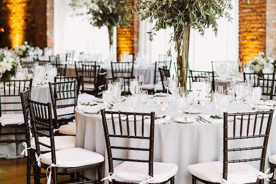 Up-Lights at The Roundhouse in Beacon, NY. Photo by Pat Furey, Florals by Dark & Diamond Floral Design.