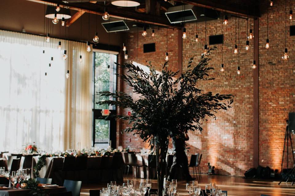 Beam Chandelier at The Roundhouse in Beacon, NY. Photo by The Ramsdens, Florals by Dark & Diamond Floral Design.
