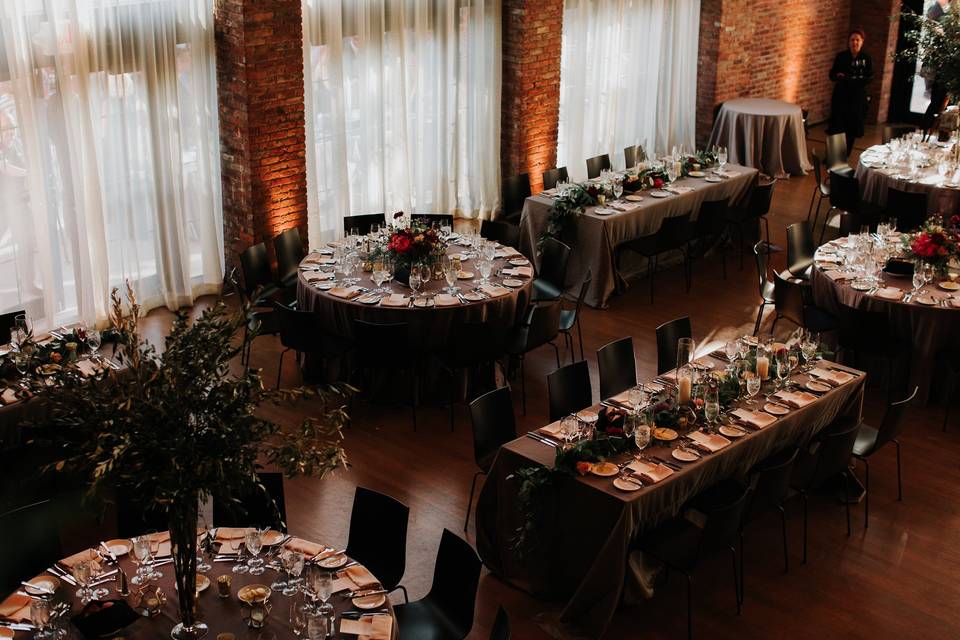 Up-Lights at The Roundhouse in Beacon, NY. Photo by The Ramsdens, Florals by Dark & Diamond Floral Design.
