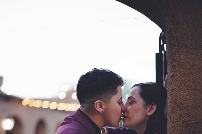 Newly married couple kissing