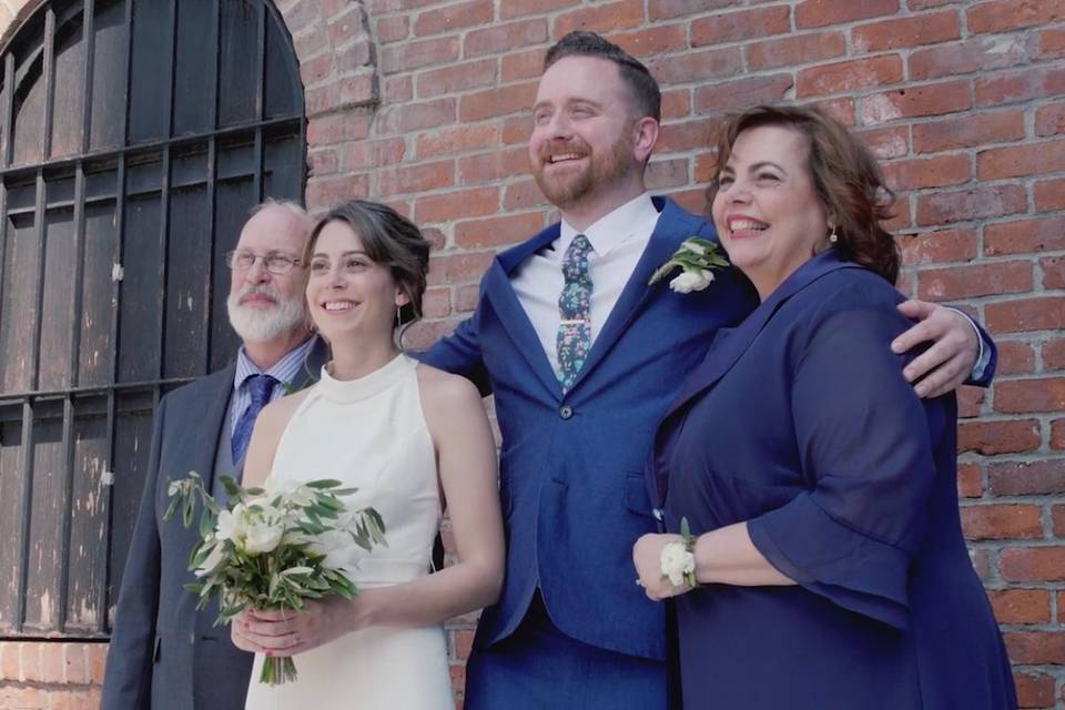 Newlyweds with loved ones