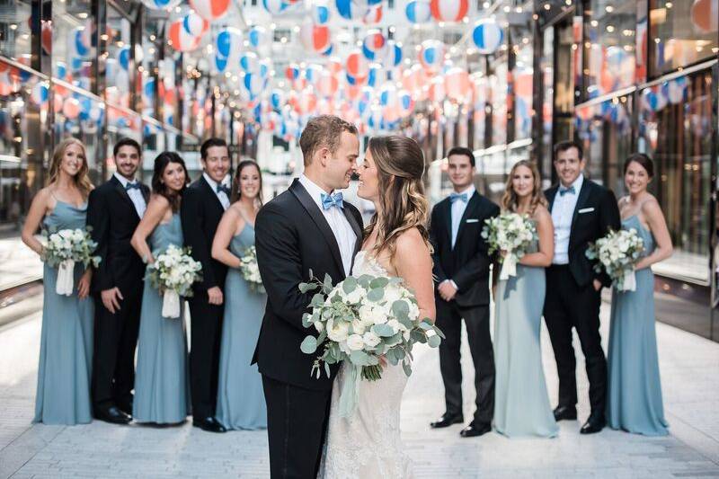 Newlyweds and their wedding party