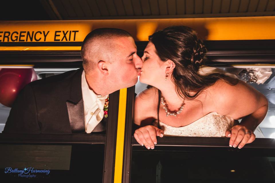 Wedding school bus kiss
