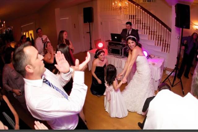 Bride and kids dancing