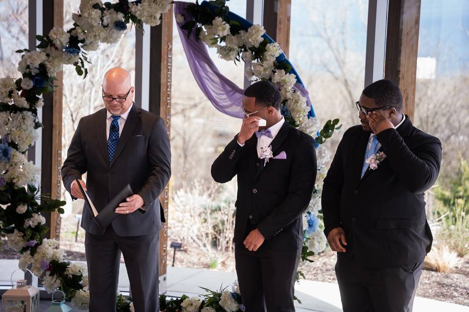 Groom and bestman crying