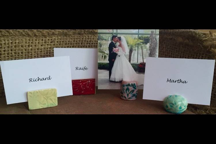 These unique, handmade ceramic place card holders double as photo holders for your guests to take home as gifts. Several styles and colors to choose from - or we can conjure something all your own!!