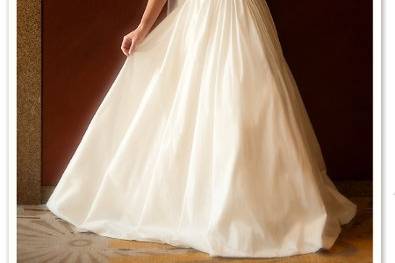 Full-length portrait of a bride in her wedding dress at the Sarasota Hyatt Hotel.