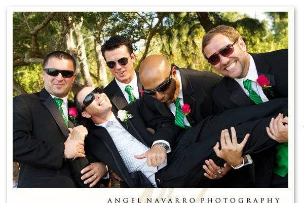 A little horsing around by the groomsmen and the groom.