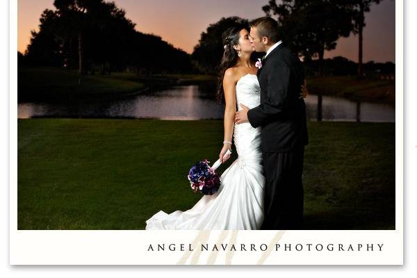 A romantic late-afternoon wedding portrait overlooking a lake.