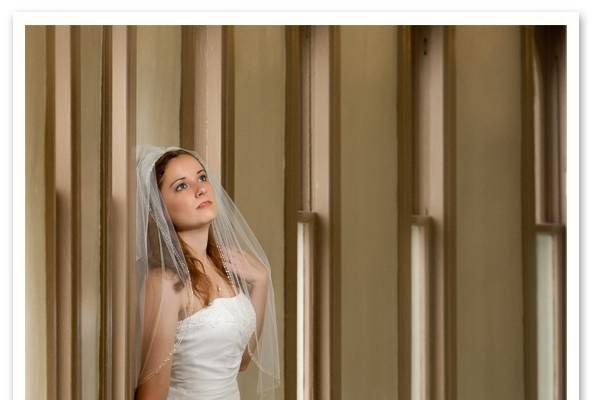 Full-length bridal portrait of a bride in Downtown Tampa, Florida.