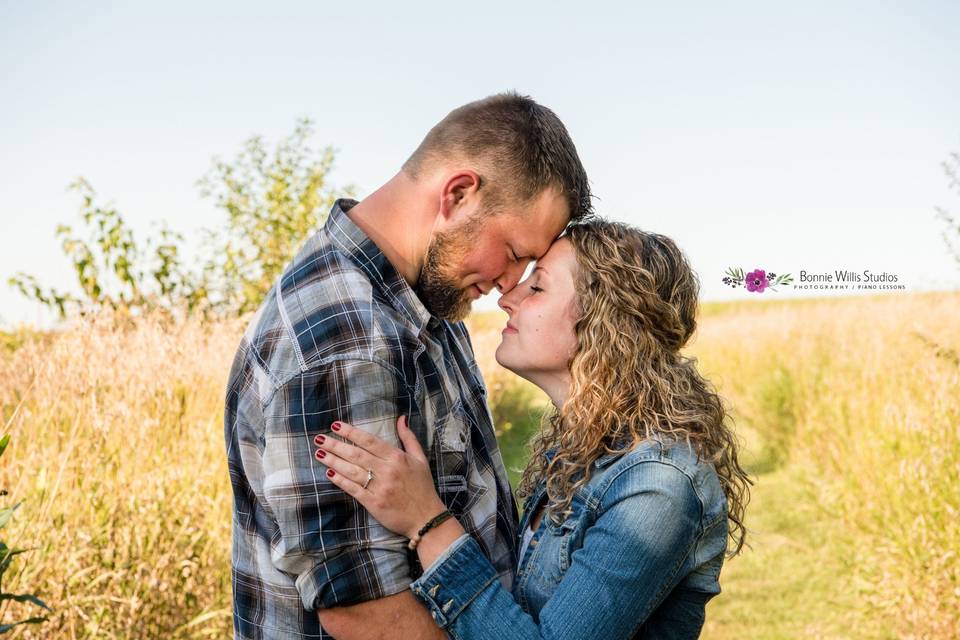 Happy couple in a field