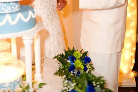 The couple having a taste of their cake