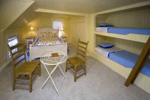 This room has a King bed and built in bunks, sleeps four, private bath with jet-tub.