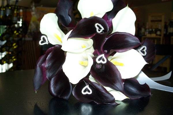 Hand tied bouquet of calla lilies