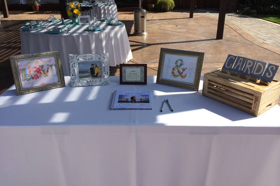Guest book table with custom guest book created by Bride's sister and Card box crate with DIY letters created by the Bride