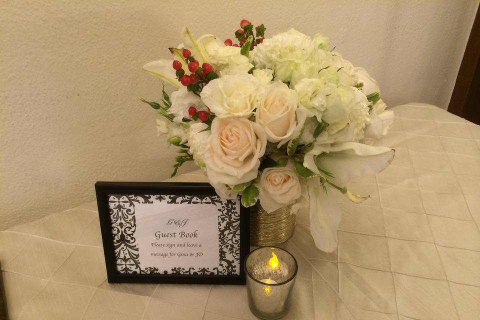 Black & white signage for guest book picture with flowers