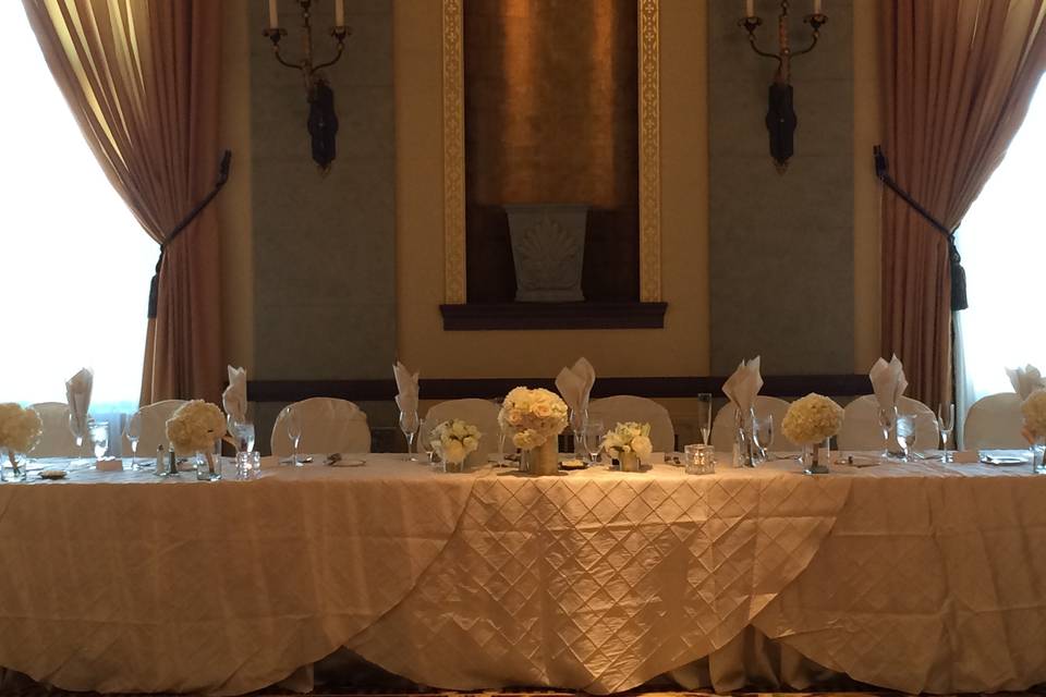 Head table in hotel ballroom