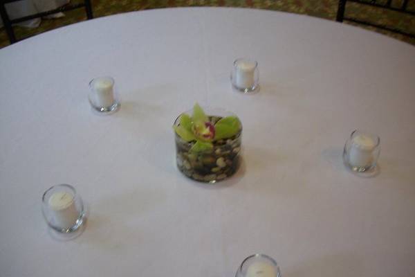 Green Cymbidium Orchid Centerpieces with votive candles