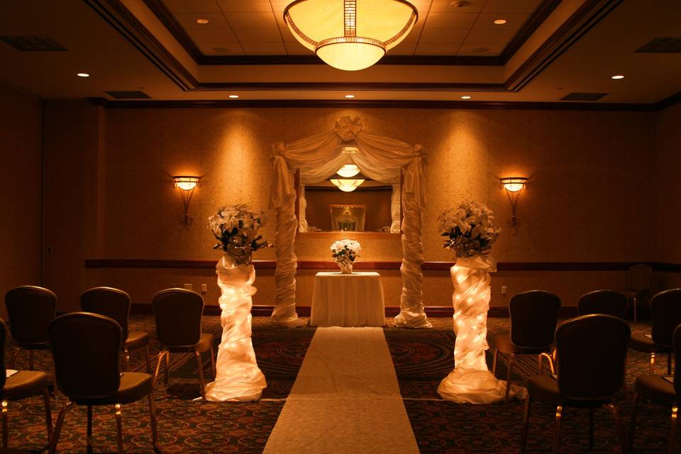 aisle runner and indoor ceremony set up