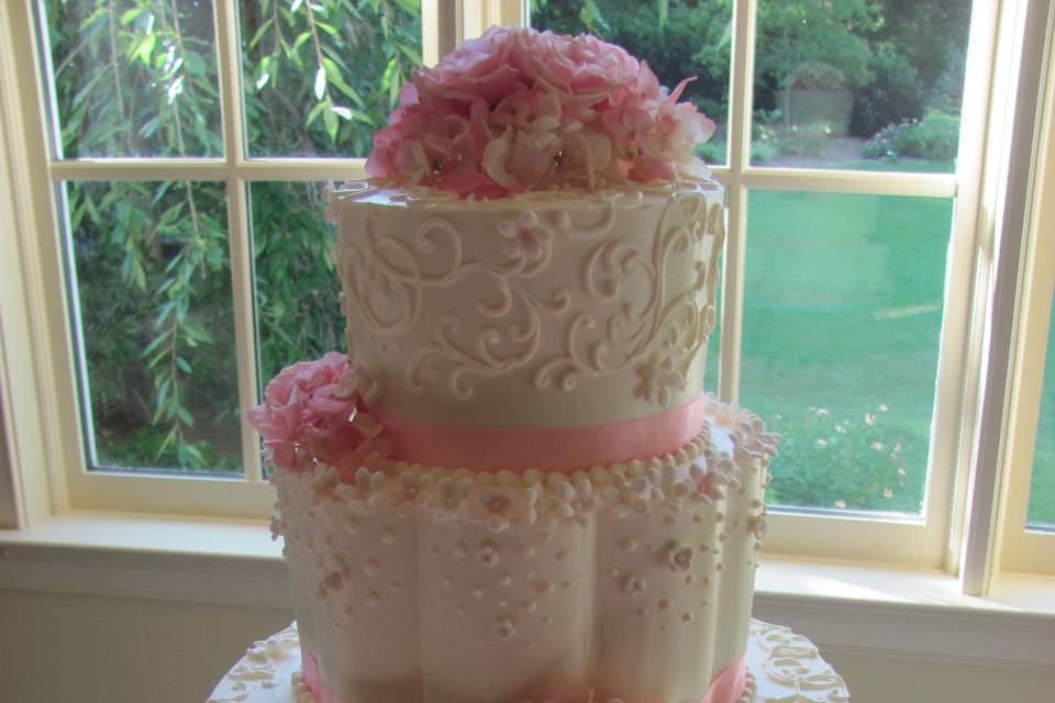 Wedding cake with pink flowers