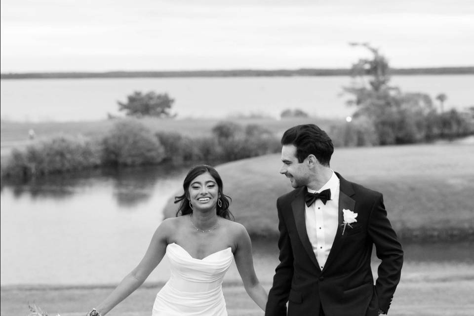 Couple running in field
