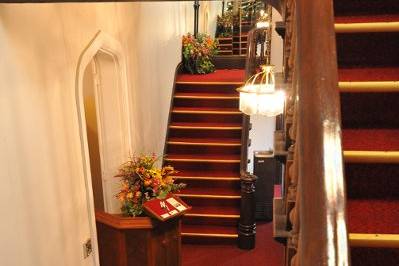 Double Staircase in the foyer of The Olde North Chapel