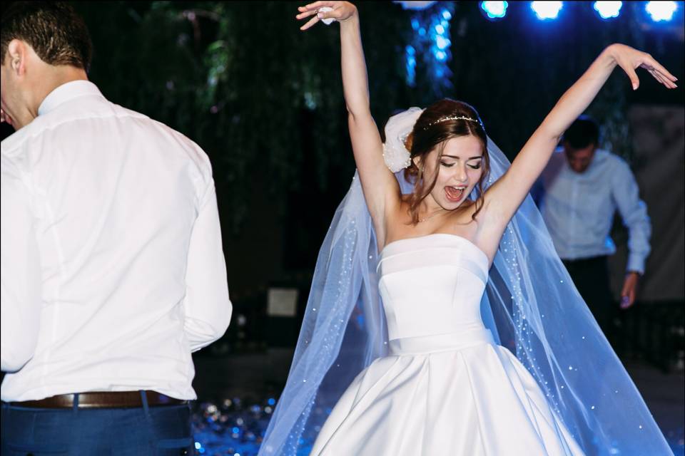 Bride dancing at her wedding