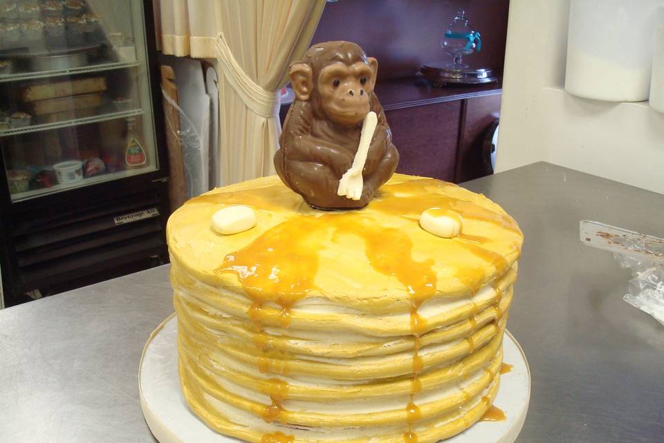 The monkey was done in a chocolate mold. The Groom obviously Loved pancakes!