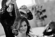 Styling the hair of the bride