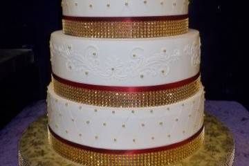 Wedding cake with red and gold