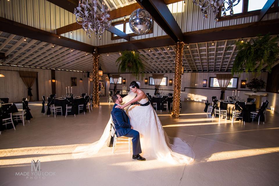 Inside reception at the Vintage White Barn at Victoria Belle Mansionwww.victoriabelleweddings.com