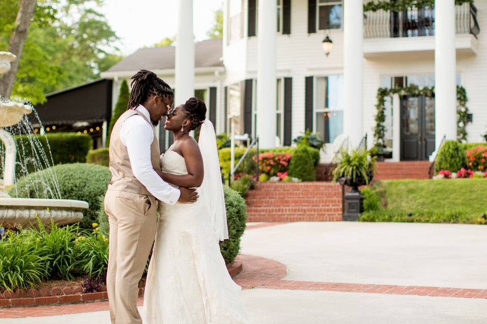 Victoria Belle Mansion and Vintage White Barn