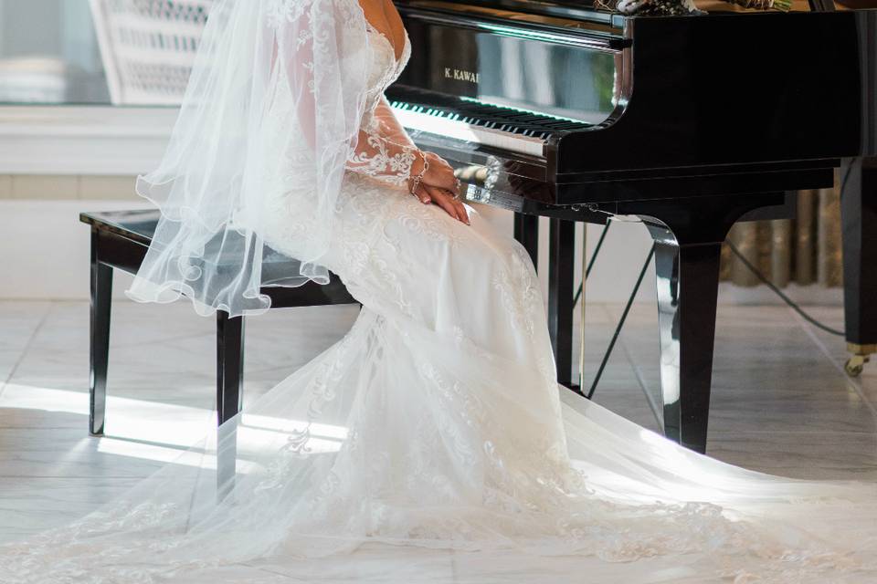 Bride by the grand piano