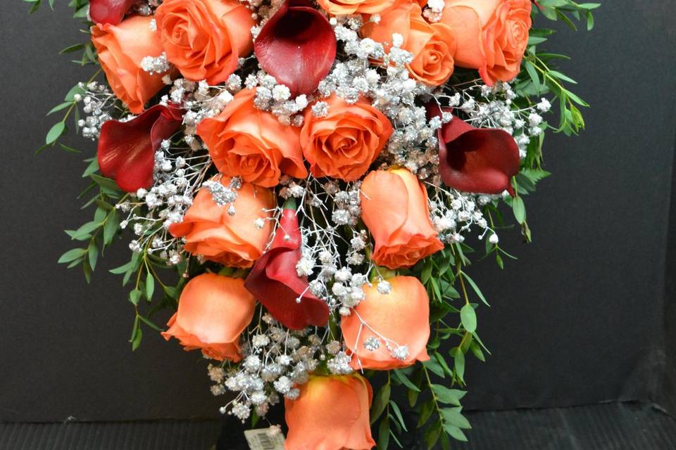 Orange roses/burgundy callas