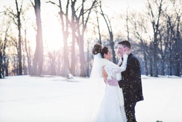 Snow day wedding | Gown: Casablanca