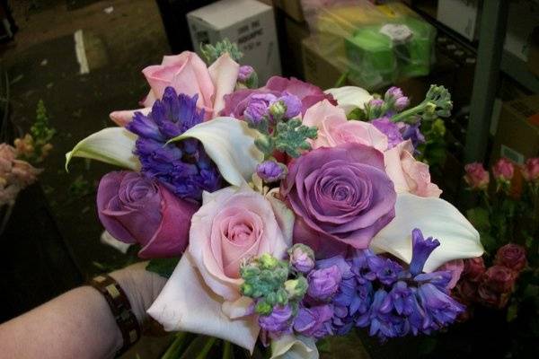Shades of lavenders, purples to pinks..... Mini callas, stock, hyacinth, roses.