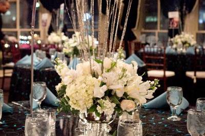 Fun centerpiece with sparkly ting-ting rising up out of the flowers and adding a bit of glitter.
1840's Ballroom