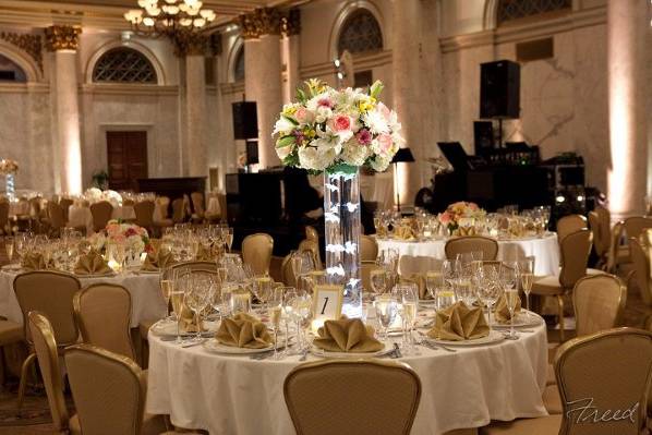 Elegant centerpiece on top of a column of floating orchids, Tremont Grand