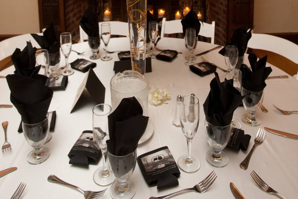 Dramatic 'cloud' of Baby's Breath floating over a striking white and black table.