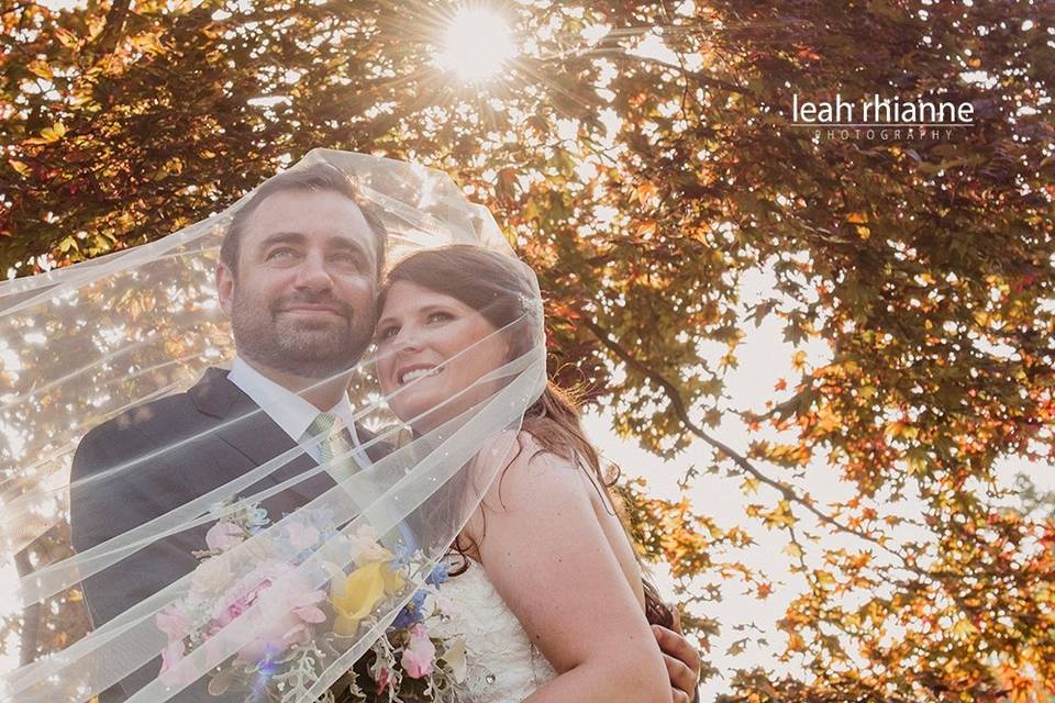 Kerry and JB on a warm June day.....
Bouquet of peonies, callas, roses, Dusty Miller and so much more.....
Photo by Leah Rhianne