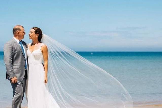 Newlyweds by the beach