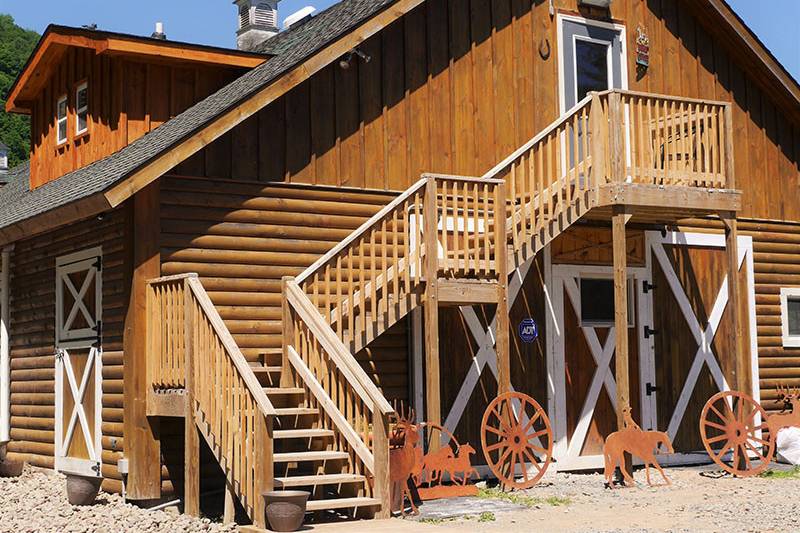 Stairway to Main Lodge Area's Upper Area w/ 7 Full size bedrooms