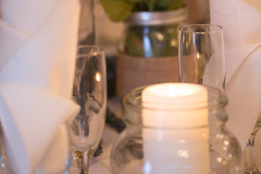 Candle and floral centerpiece